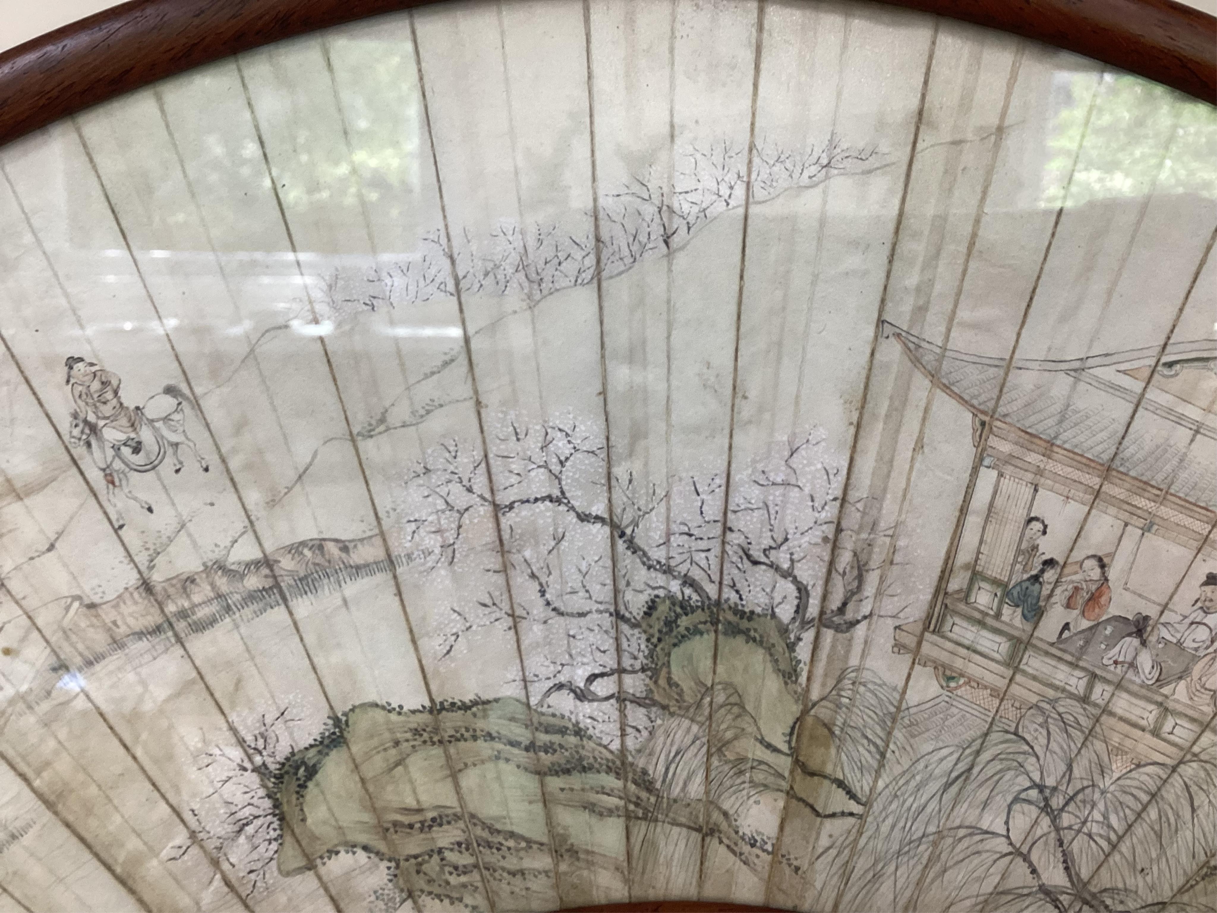 A Chinese painted leaf fan and hardwood stand, late 19th century